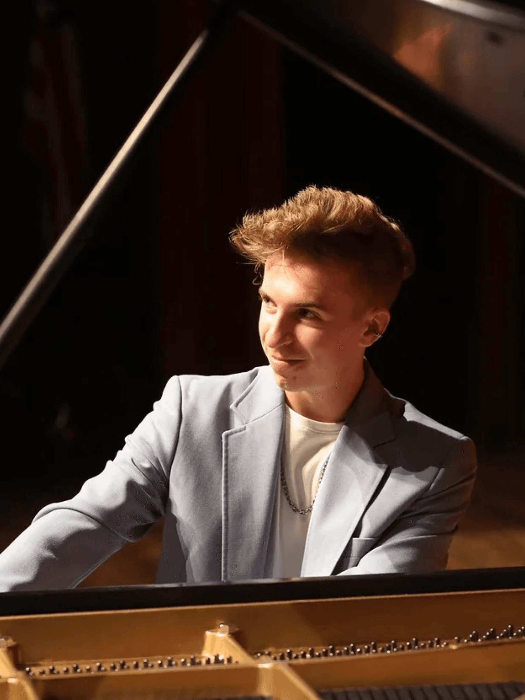 Sammy Hanson playing piano