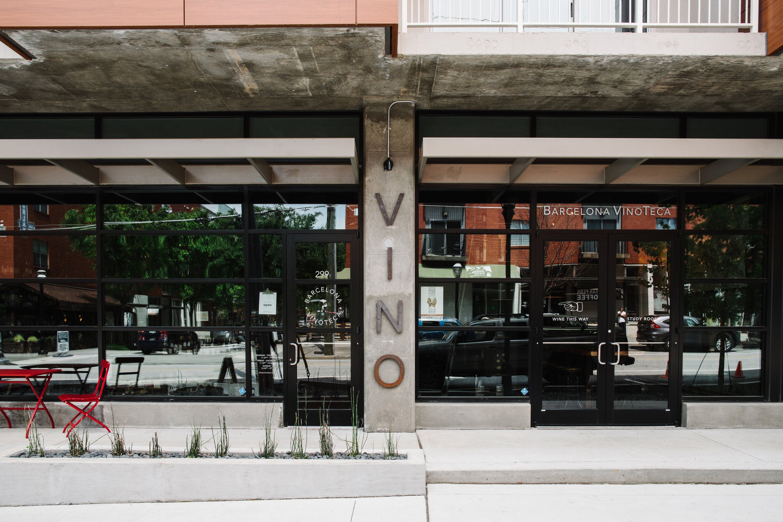 street view of VinoTeca and Bill Hallman Boutique